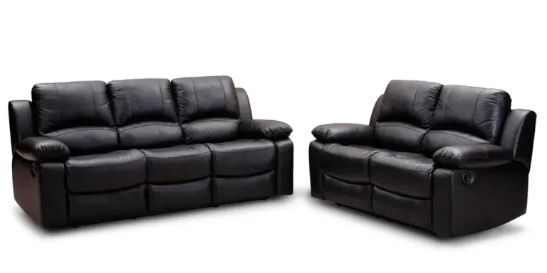 Two black leather sofas—a large three-seat sofa and a matching loveseat—displayed against a white background.