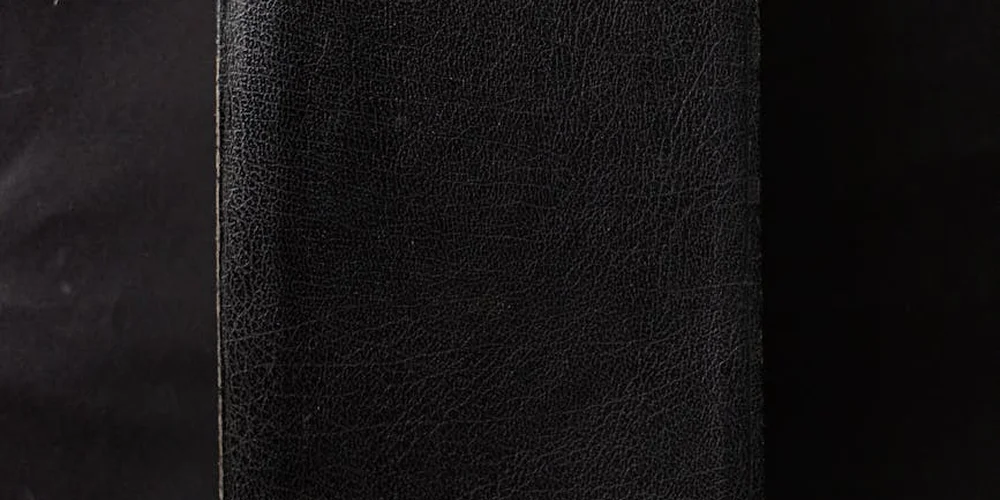 Close-up image of black leather texture