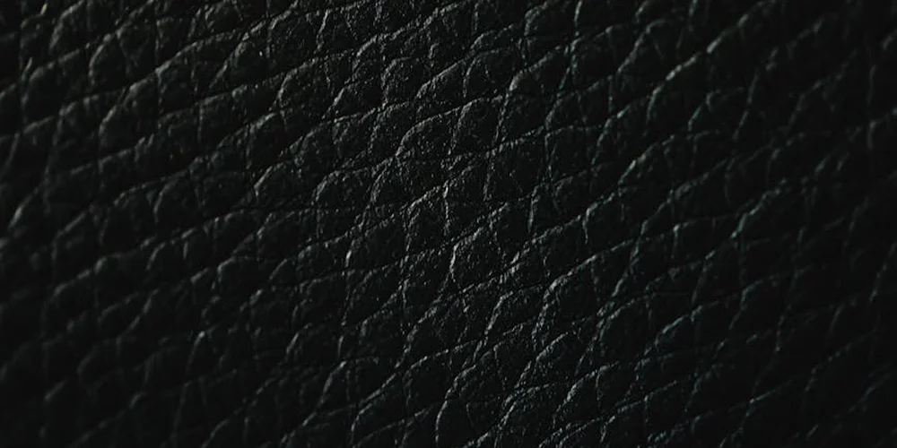 Close-up view of black leather grain