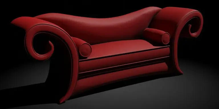 Red leather sofa with curved arms on a dark background