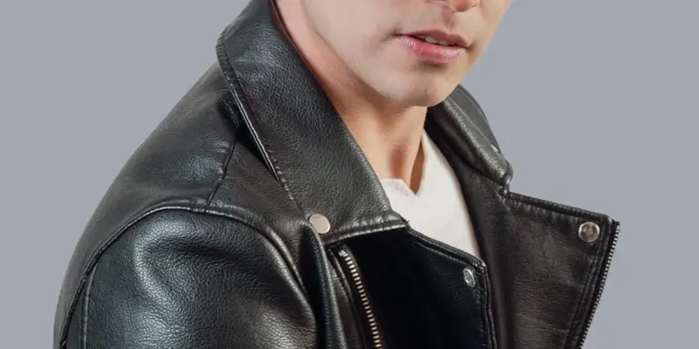 Close-up of a person wearing a black lambskin leather jacket