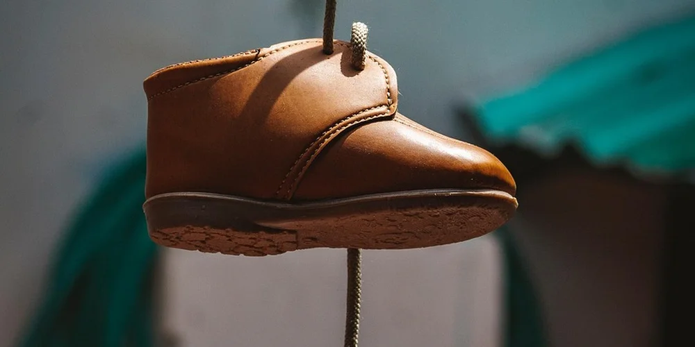 How Do You Remove Mud Stains from Suede Boots and Shoes Without Damaging the Material?